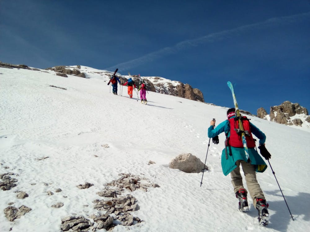 Bootpacking towards the summit of the Piz da Lec.