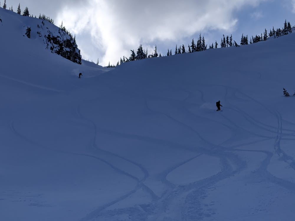Skiing the gully feature on our last run of the day