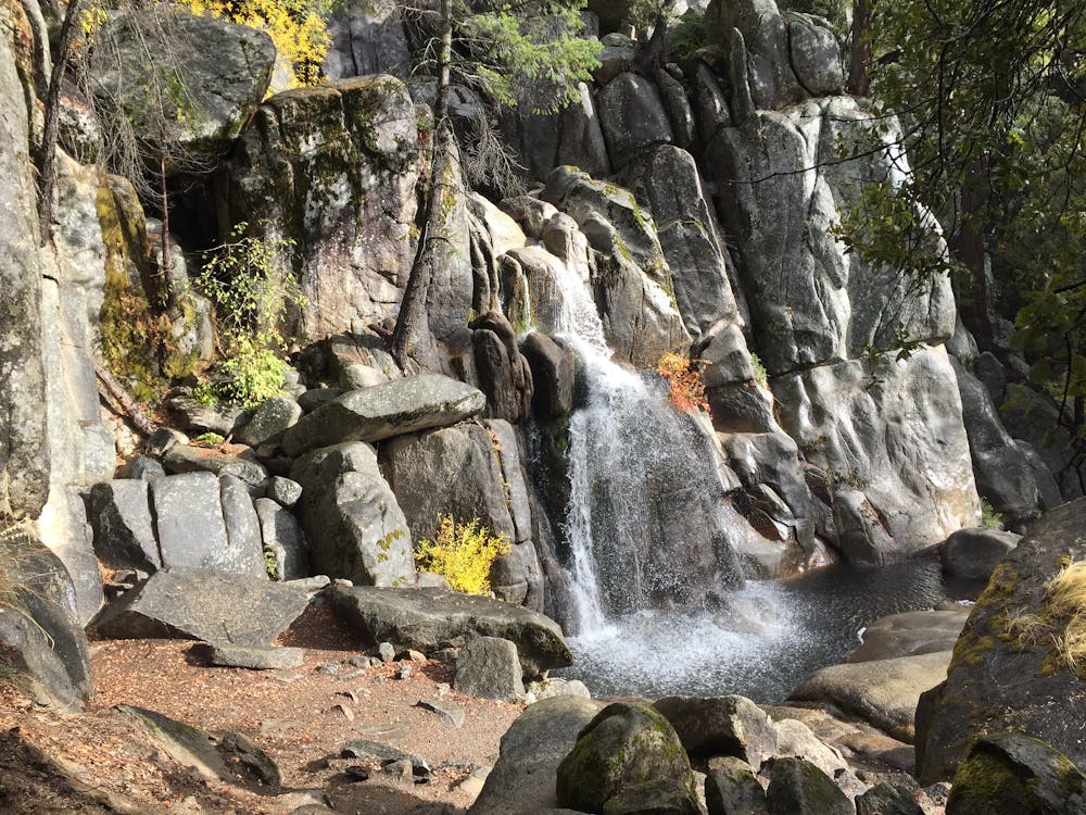 A lower waterfall along the trail, shown at low flow in autumn