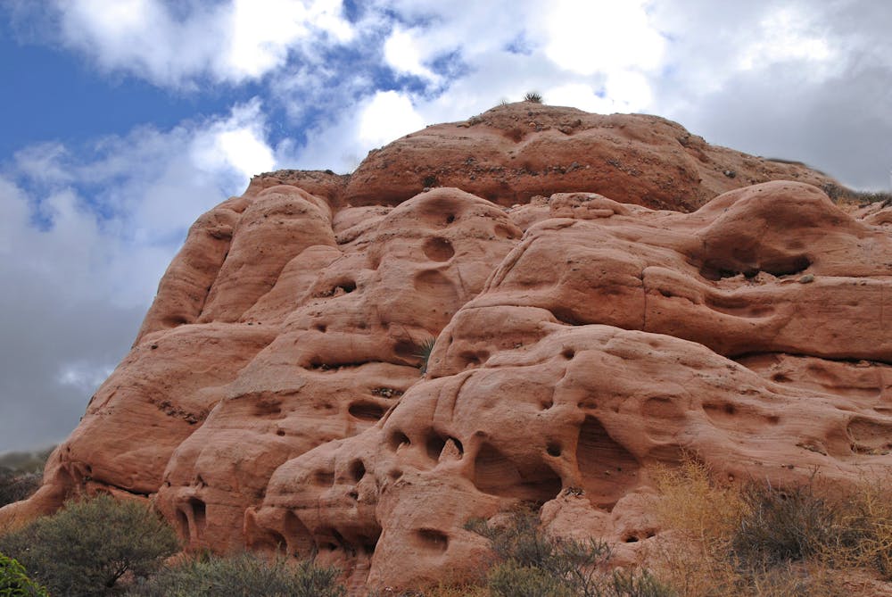 One of many pocketed sandstone outcrops