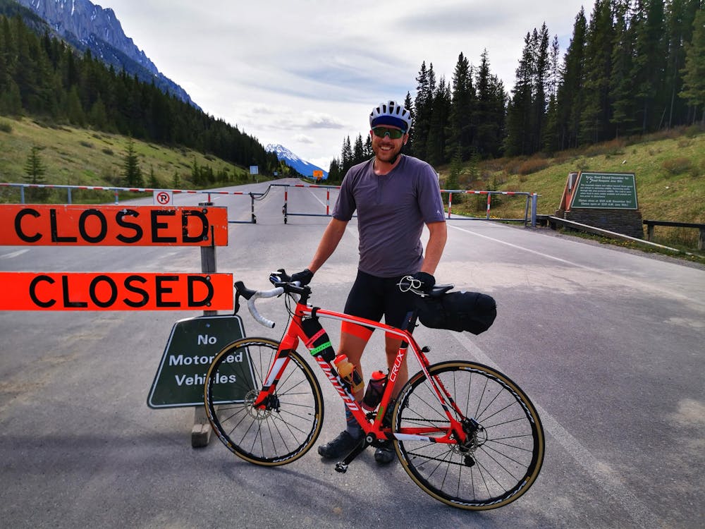 Author at the northern gate closure on Highwood Trail