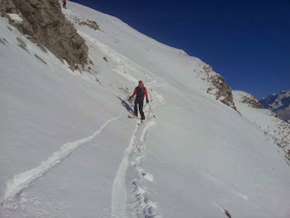 The traverse into the face from the summit.