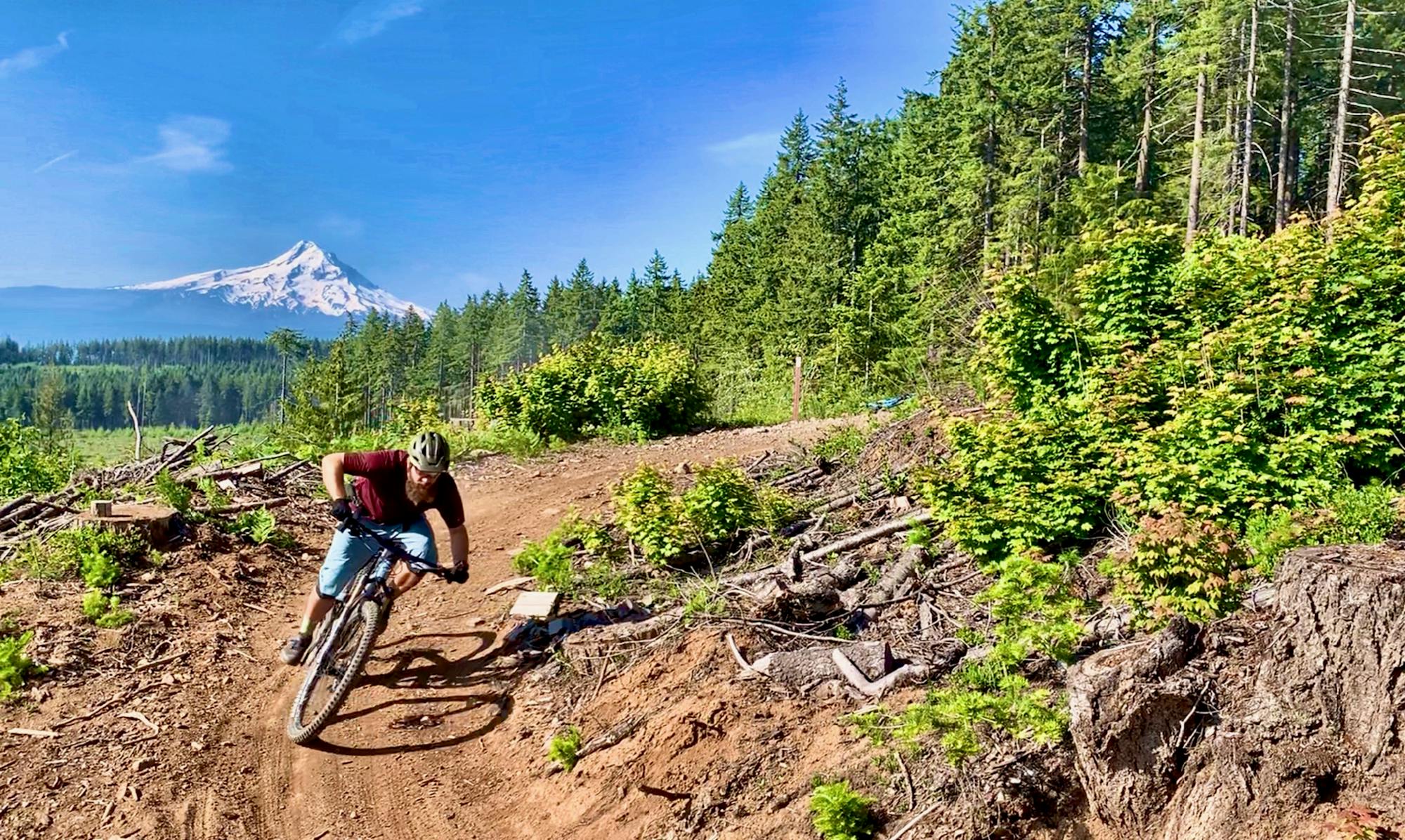 Greg riding with Mount Hood in the background