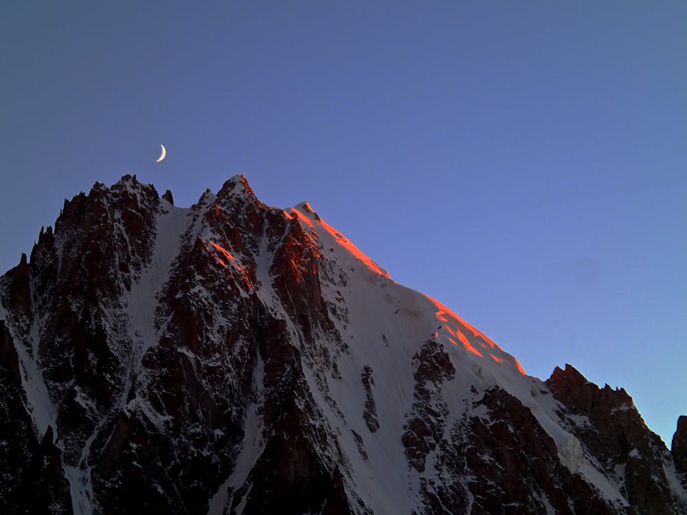 Crescent over Aiguille Verte in sunset