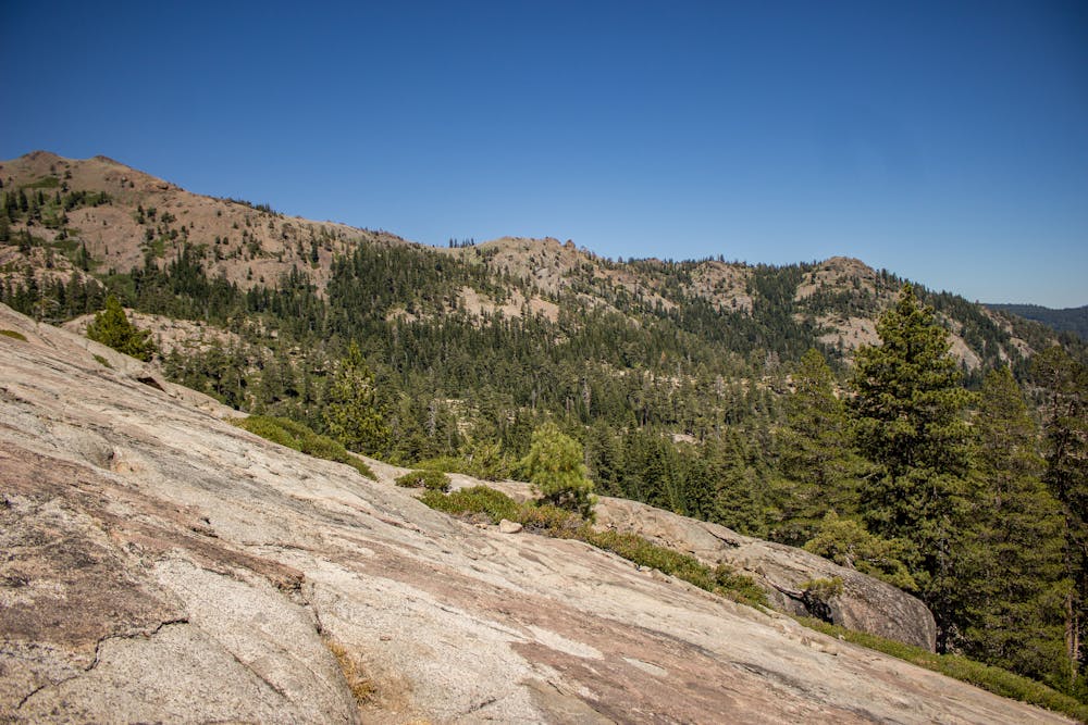 Hiking up bare granite slabs