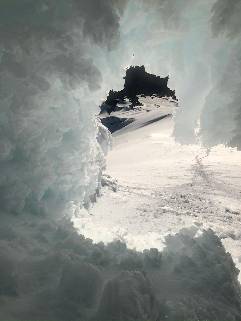 Amusing shapes in the ice create a cave