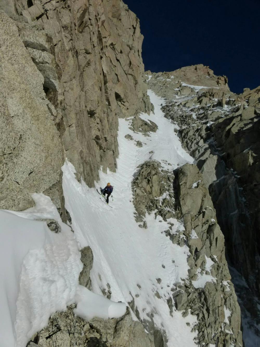 The exposed traverse to reach the Col Adams Reilly.