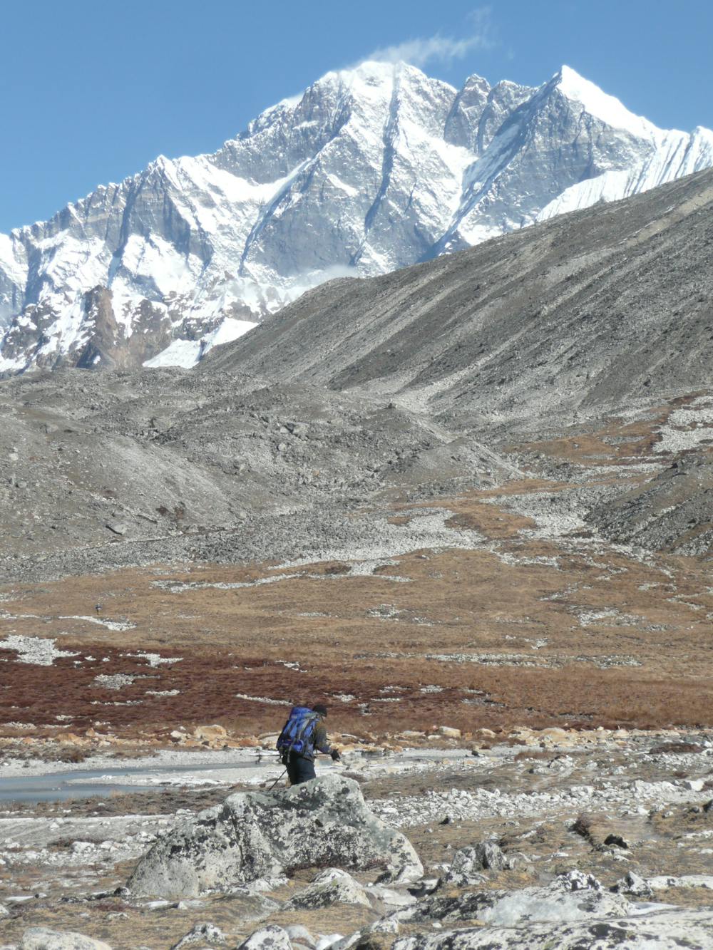 Typically desolate terrain in the Hongku, with the imposing south face of Lhotse dominating the view ahead.