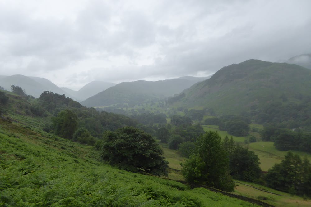 Looking down at the valley and surrounding fells