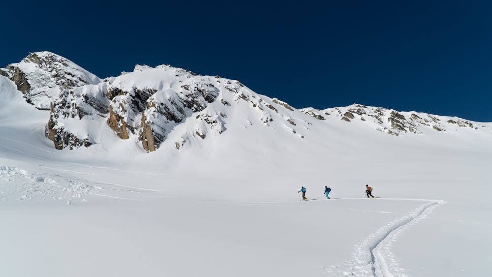 The crew sliding along Hospital Bowl on their way to Video Peak