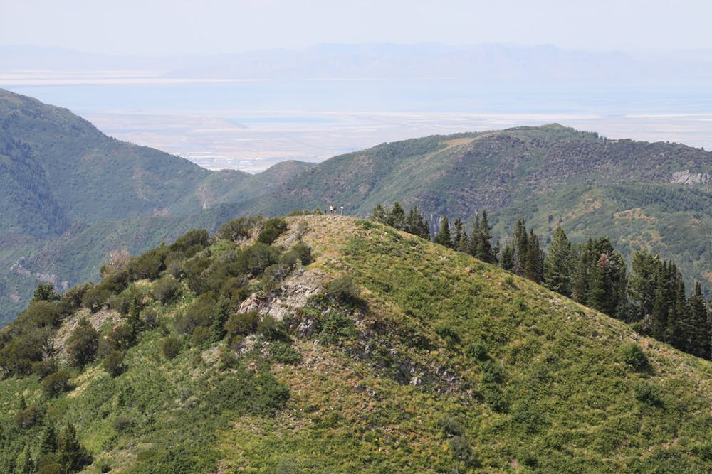 Hikers atop Millvue Peak