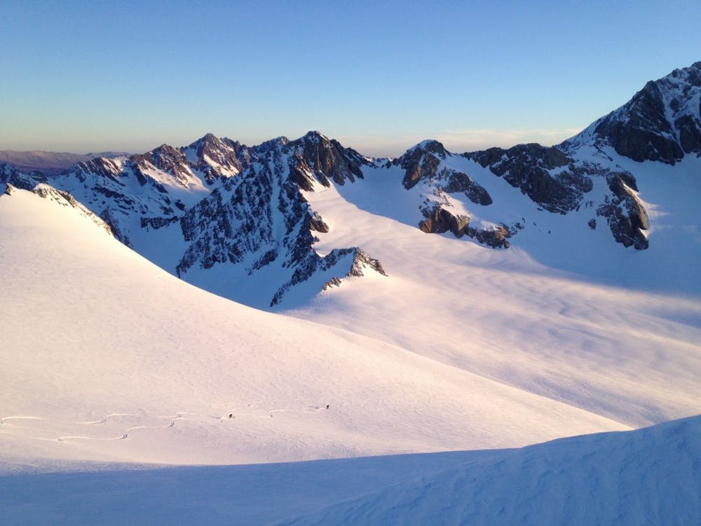 Skiing down Mount Alymer near sunset