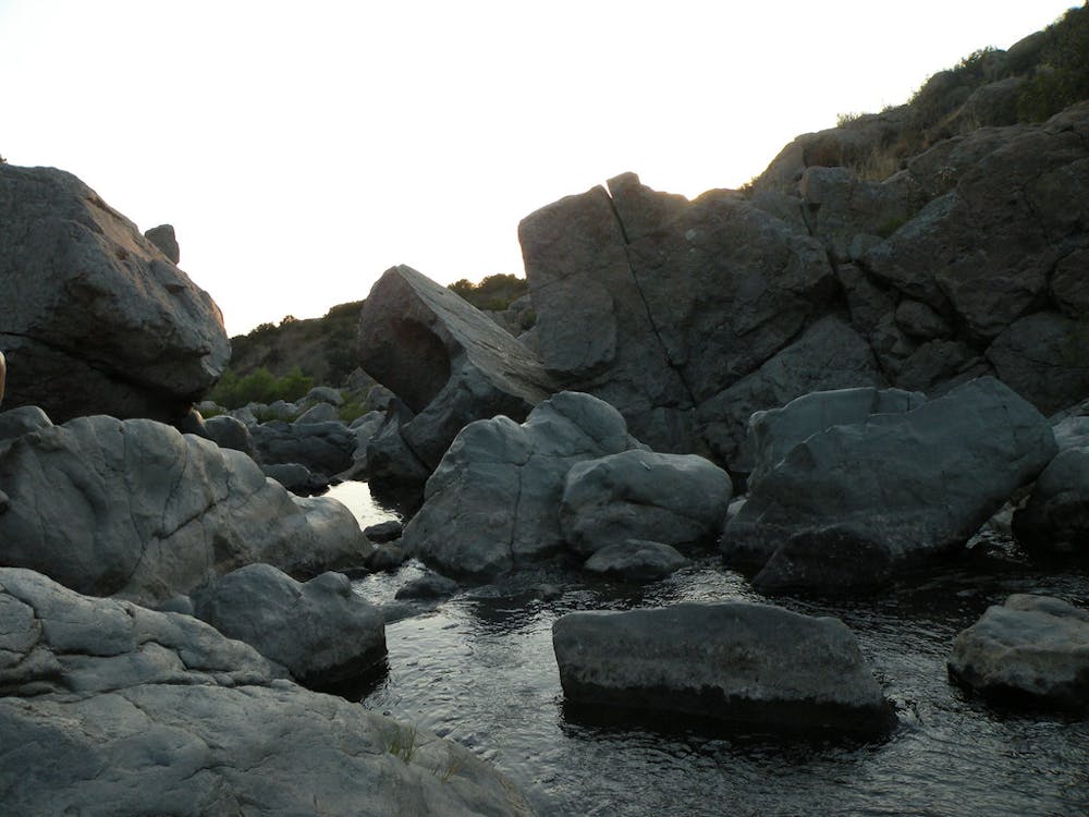 Large boulders in the creek at the falls