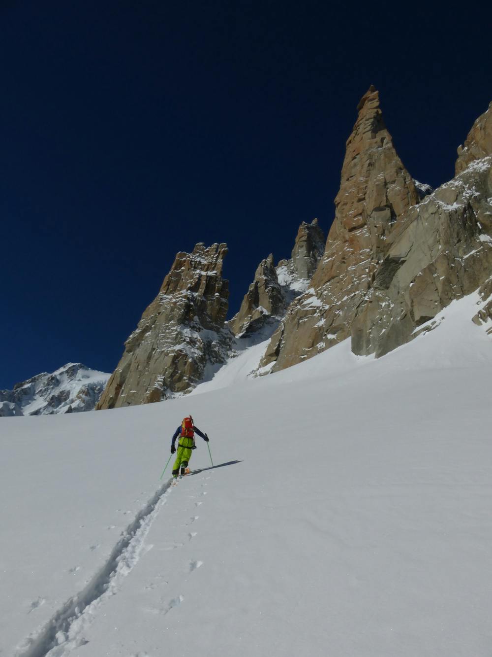 Skinning up towards the start of the approach couloir behind the Grand Capucin