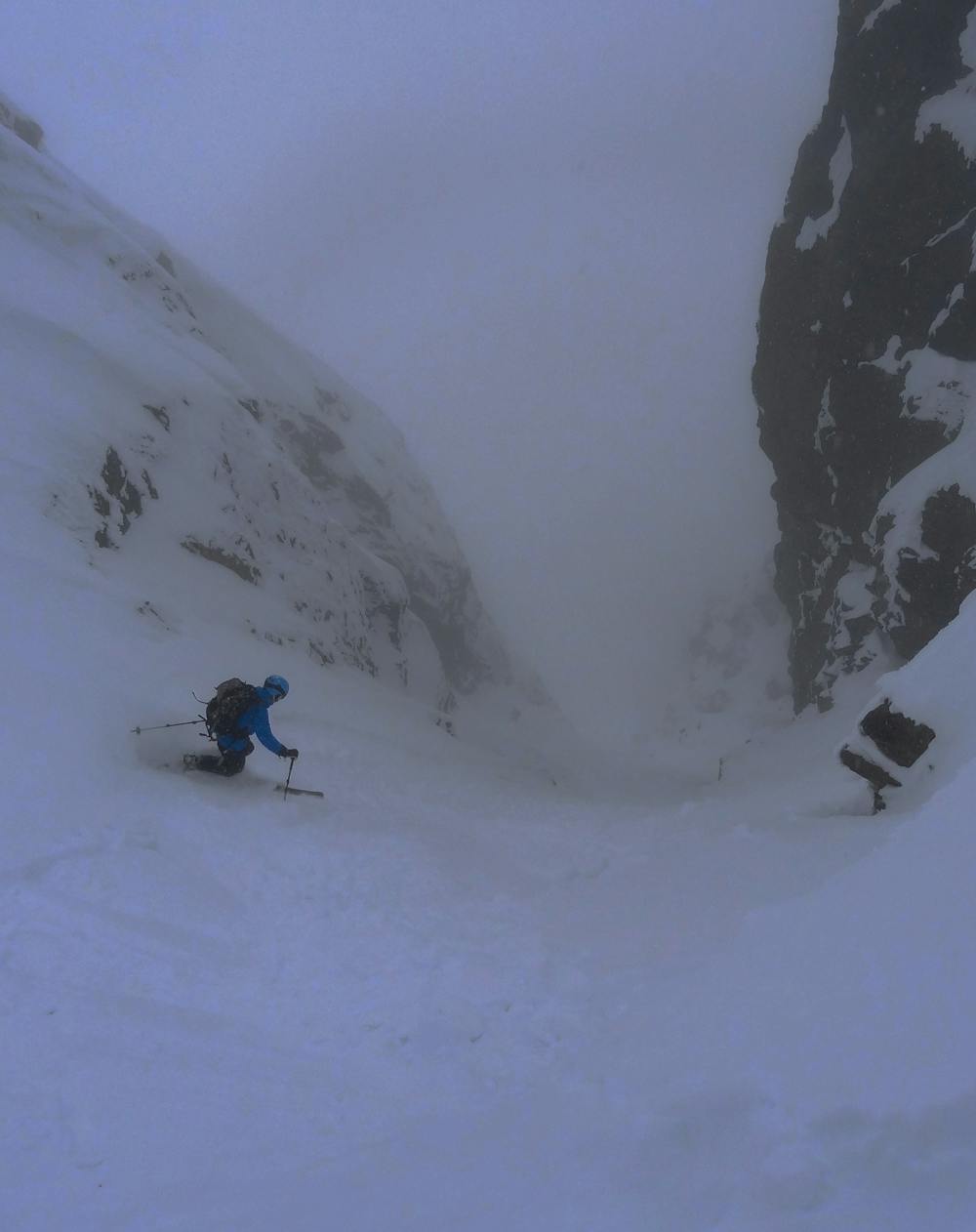 Dropping into the couloir in atmospheric conditions
