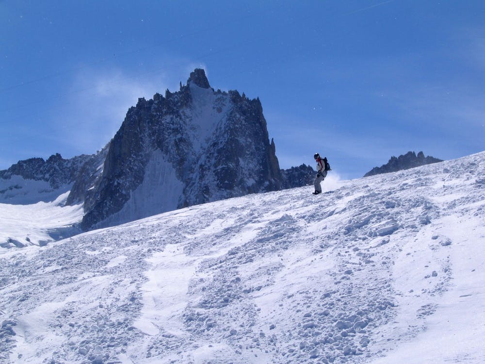 Ruth snowboards down the Glacier du Tacul