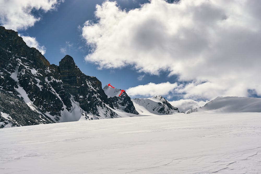On the Bow glacier, with Mt Olive in the background. Arrows indicate the ridge