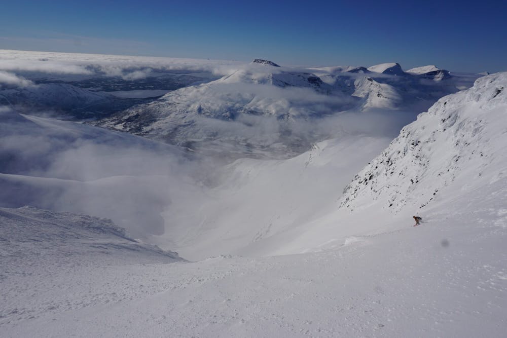 Skiing down the Northwest Bowl of Istinden