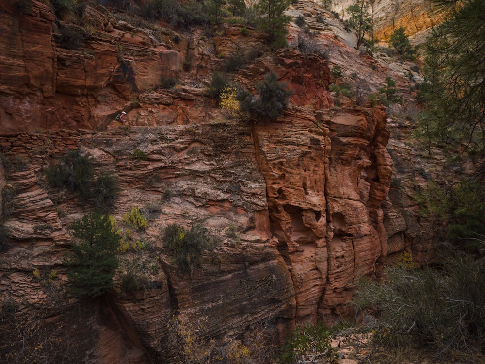 The trail traverses steep canyon walls.