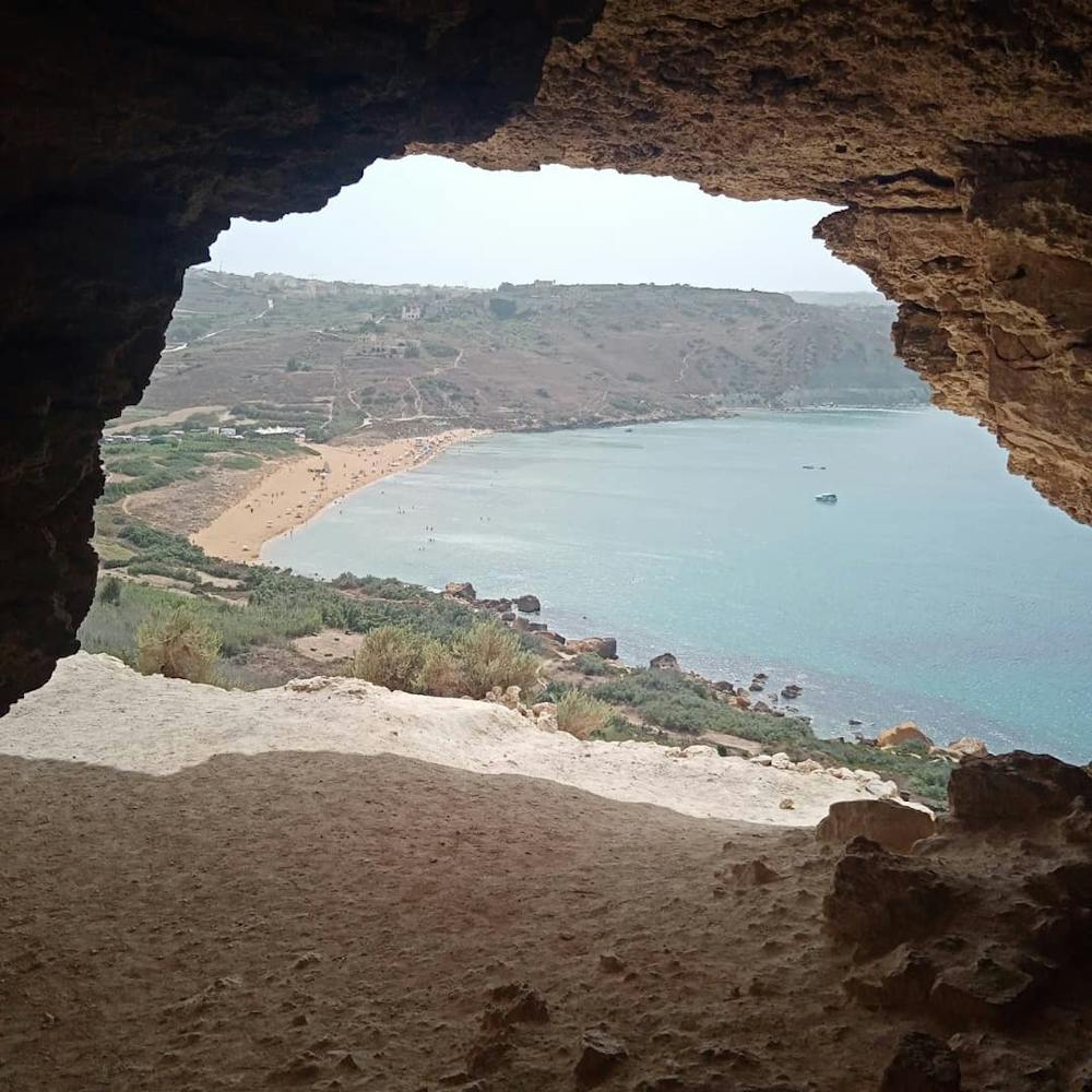 Looking down on Ramla Bay from the Tal-Mixta Cave