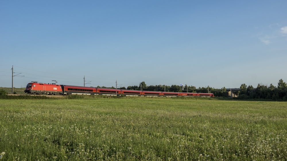 Field, train, and sky in Donaustadt