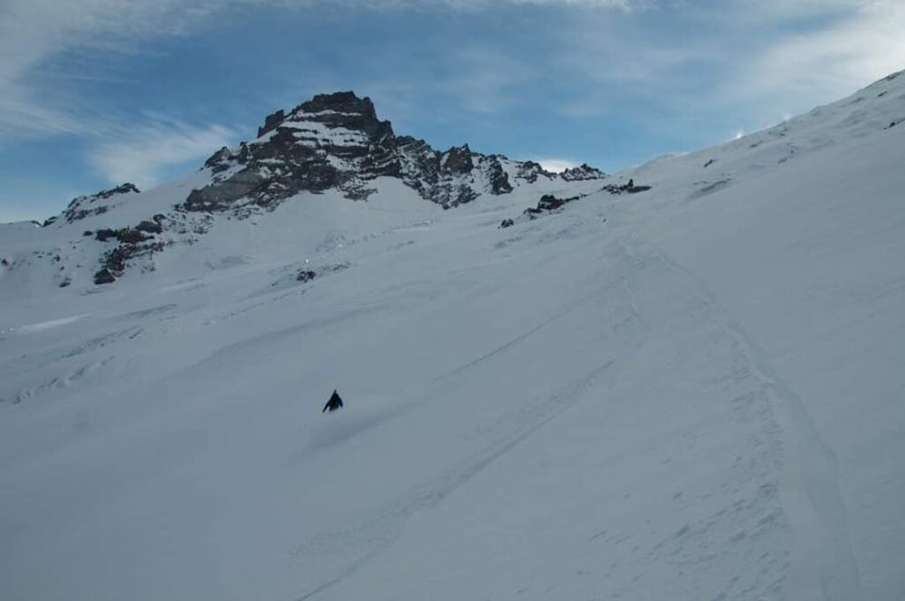Scenic powder turns while heading down the Emmons Glacier