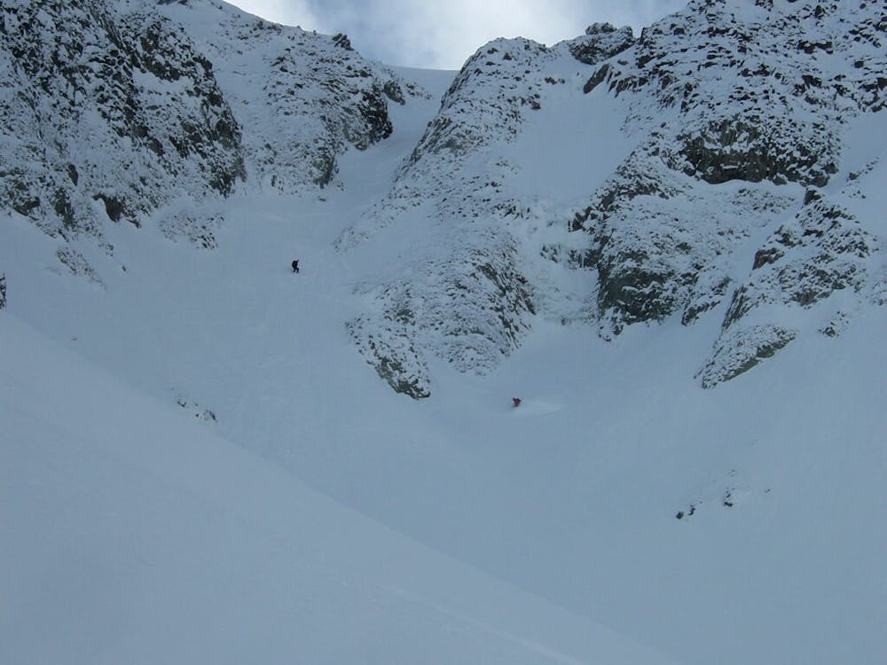 Skiing down the crux chute of Mount Ruth