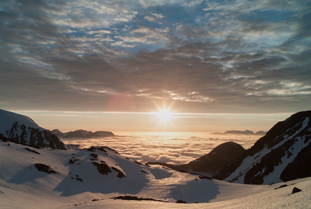 Midnight sun during the ascent of Storsandnestinden