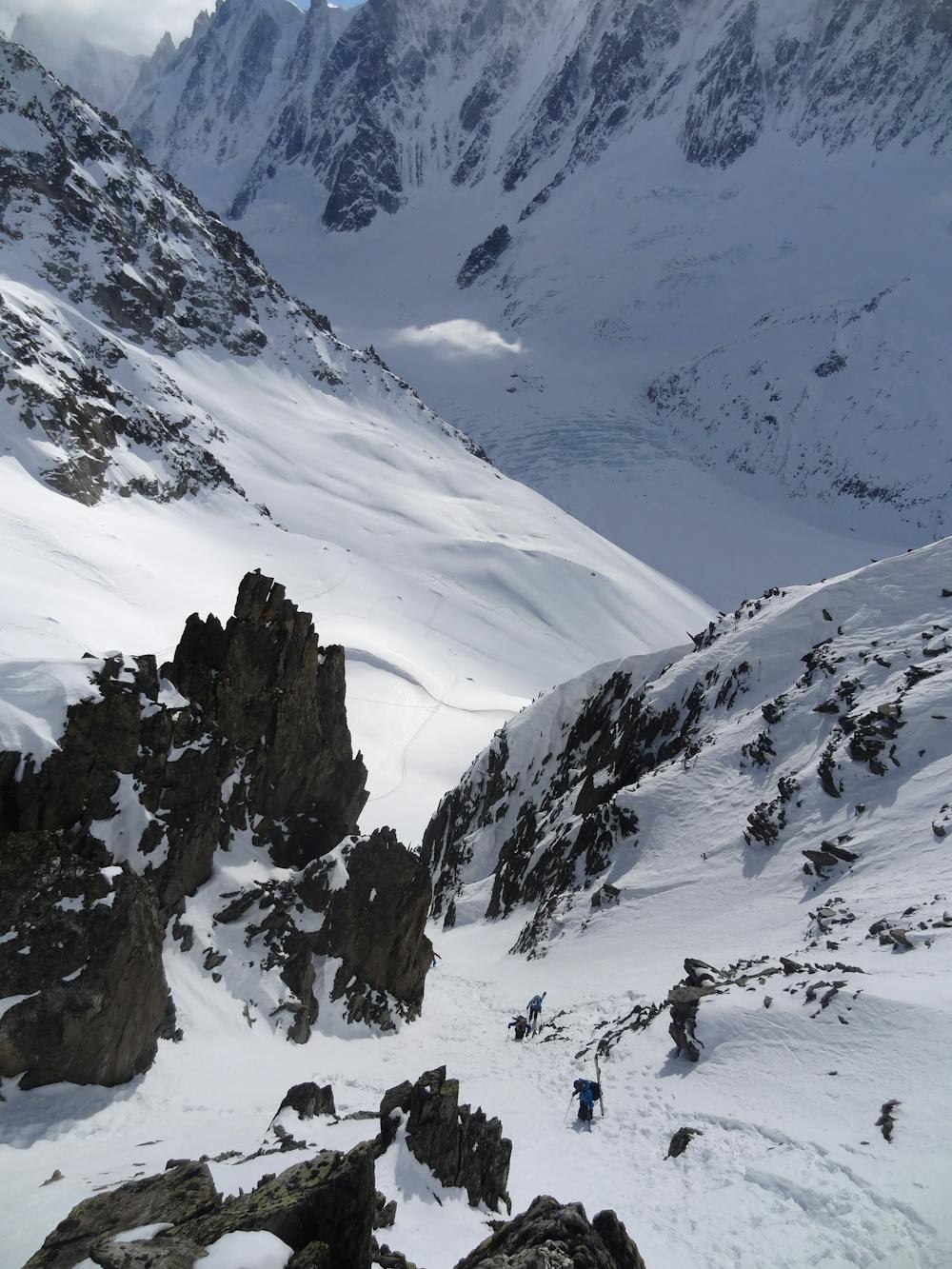 Booting up the couloir that leads to the Col.