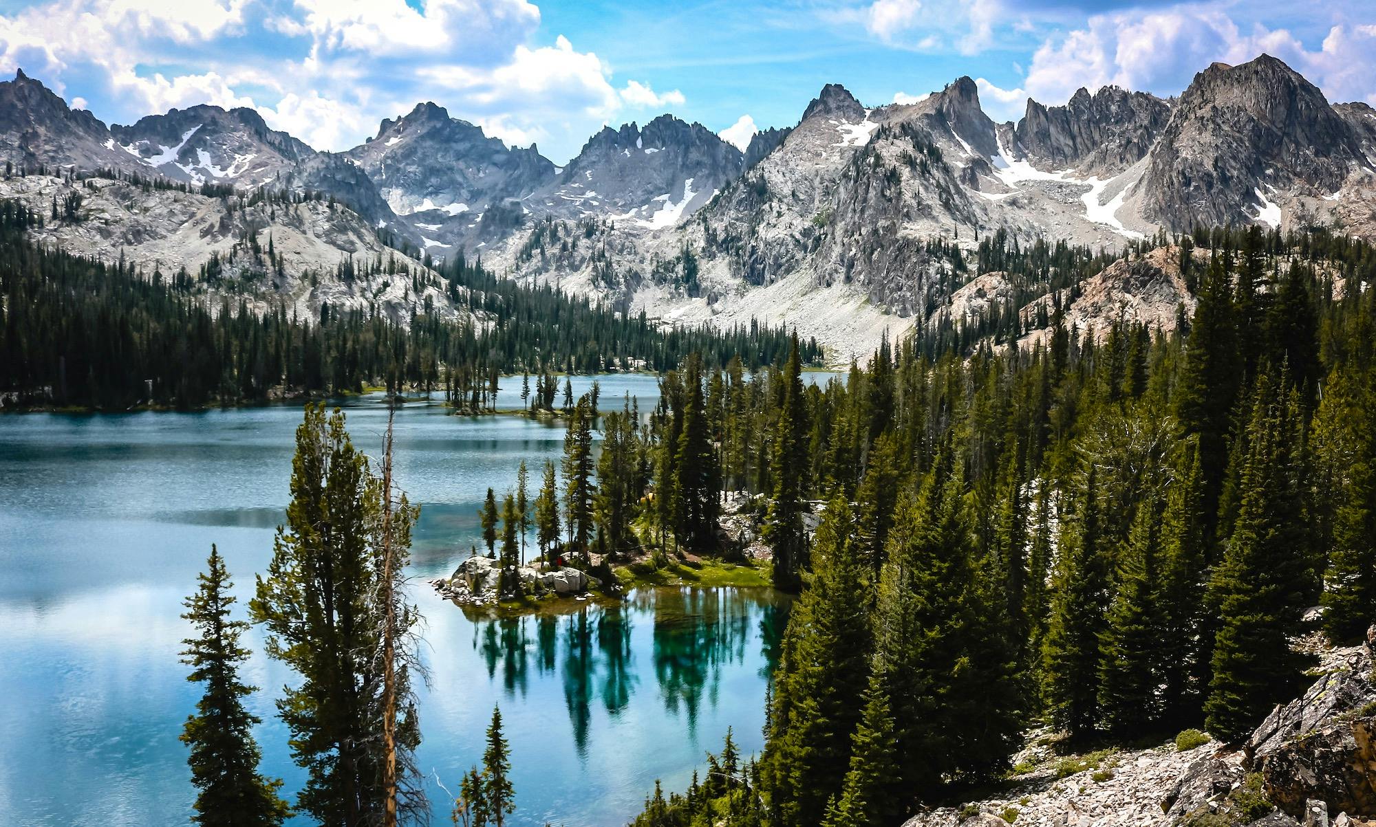 An alpine lake and jagged peaks of the Sawtooths