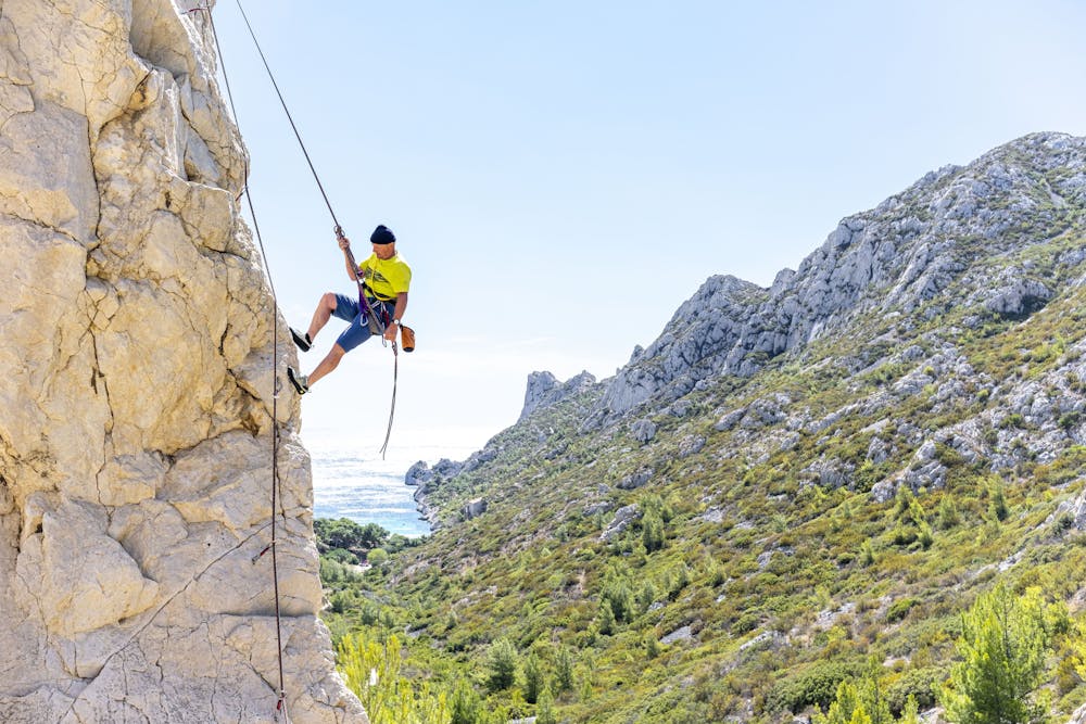 Climber in calanque sormiou marseille france escalade rock