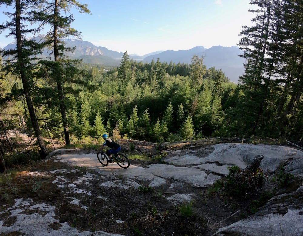 Beautiful views from Squamish's slabs. Rider: Jas