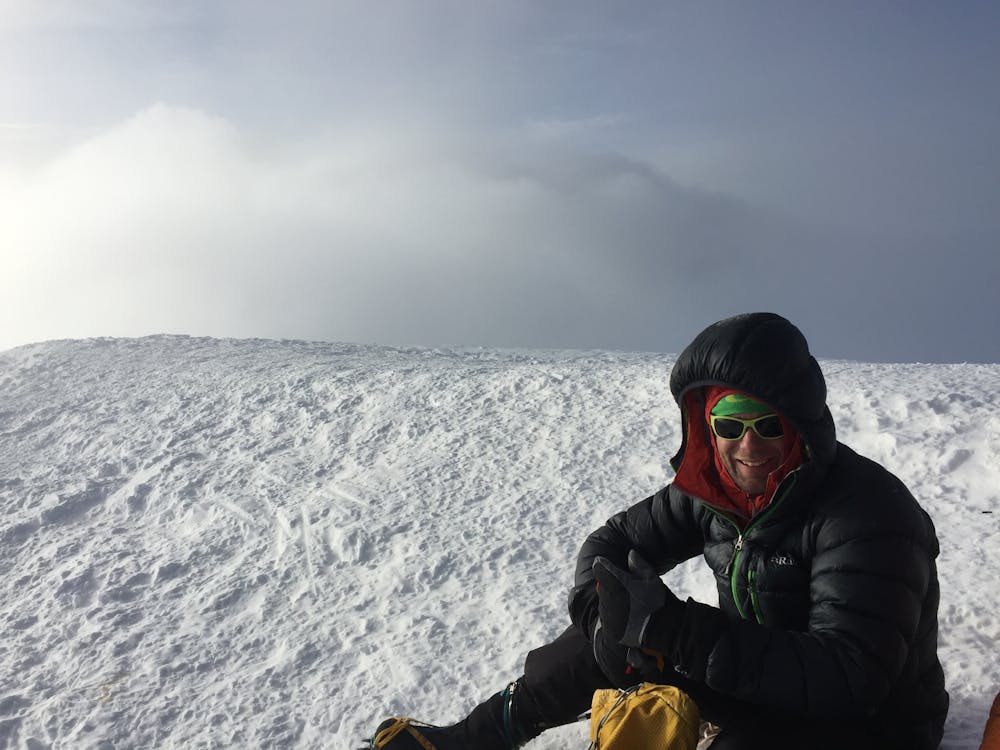 Ben Tibbetts relaxing on the summit of Mont Blanc