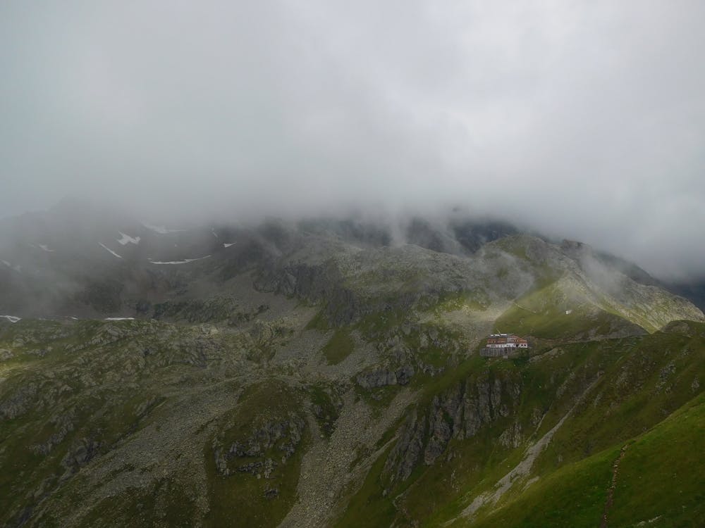 The Innsbrucker Hütte appearing out of the mist