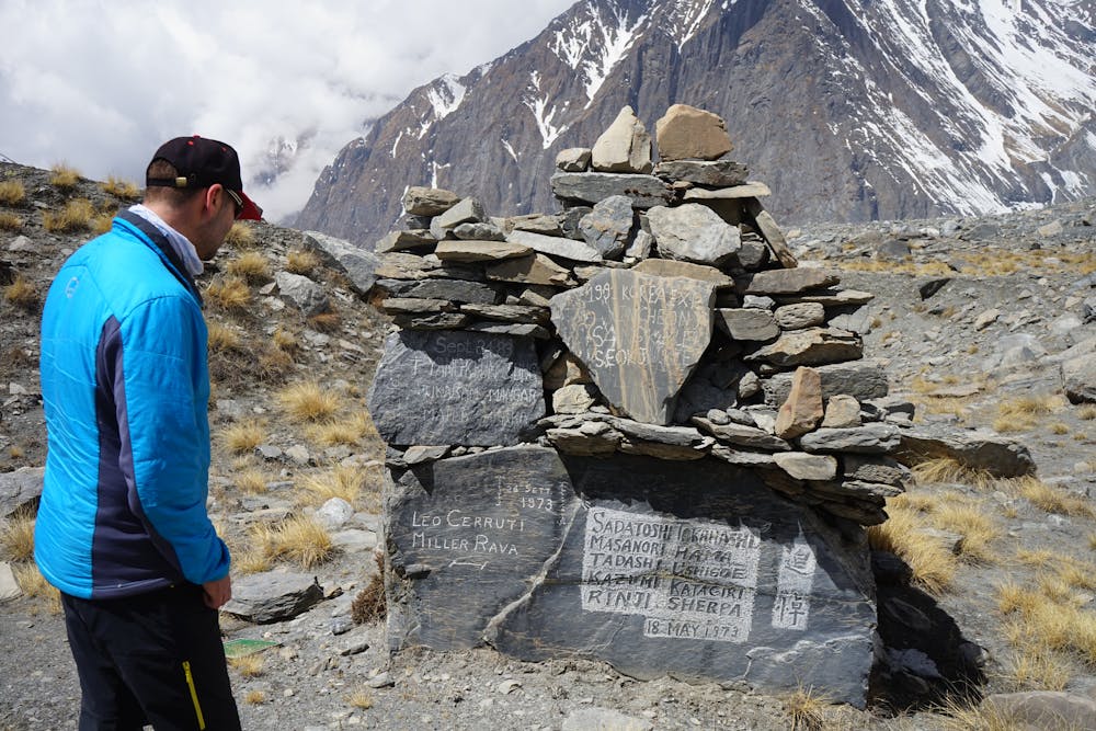 Hakon looking at the memorial of the lost climbers which is situated on the route to Camp 1. 