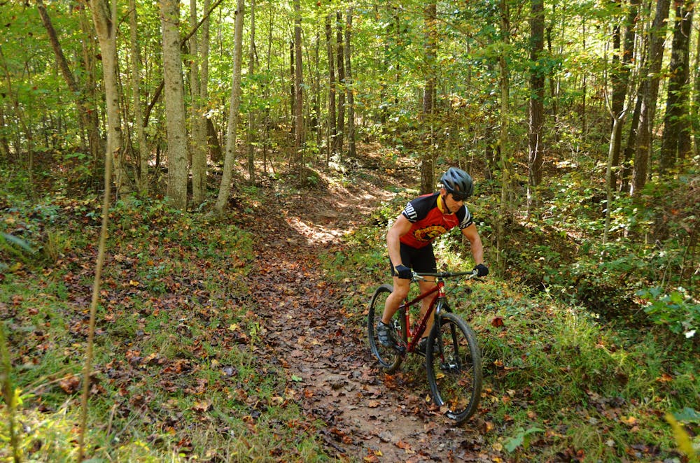 A mountain biker uses the Jake and Bull Trail System