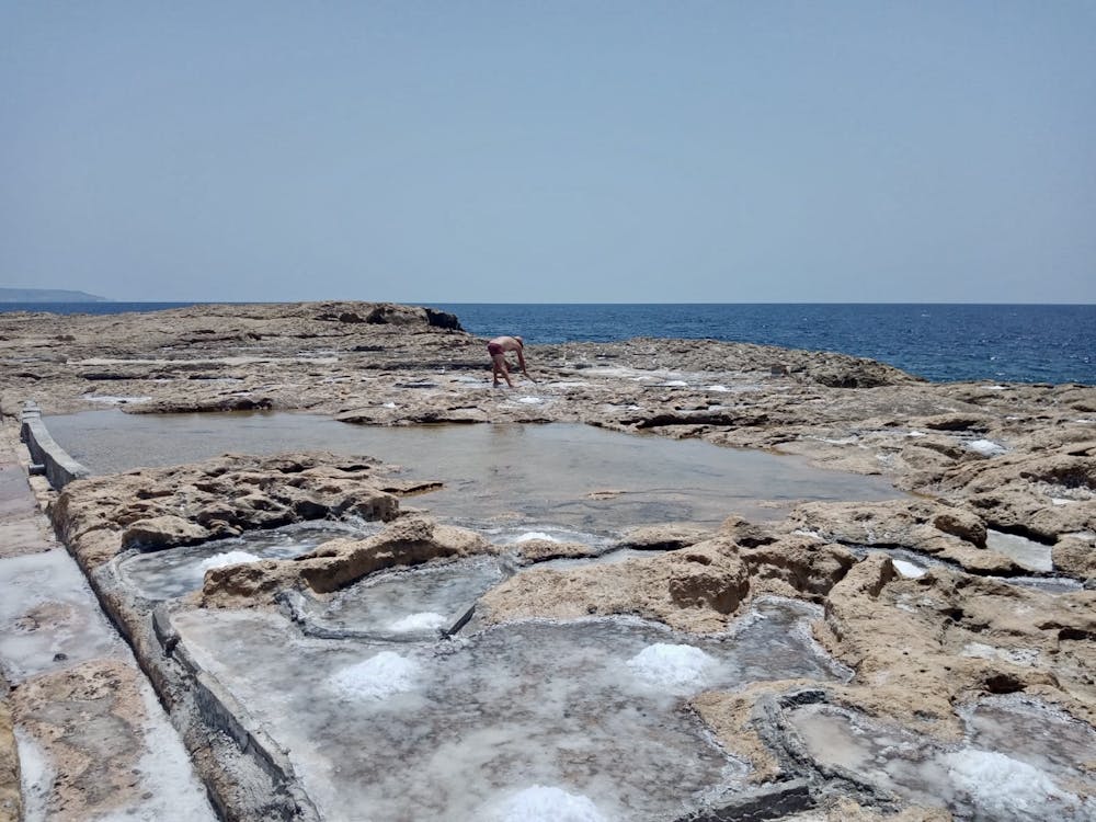 Salt being mined by hand at Ras il-Ħobż