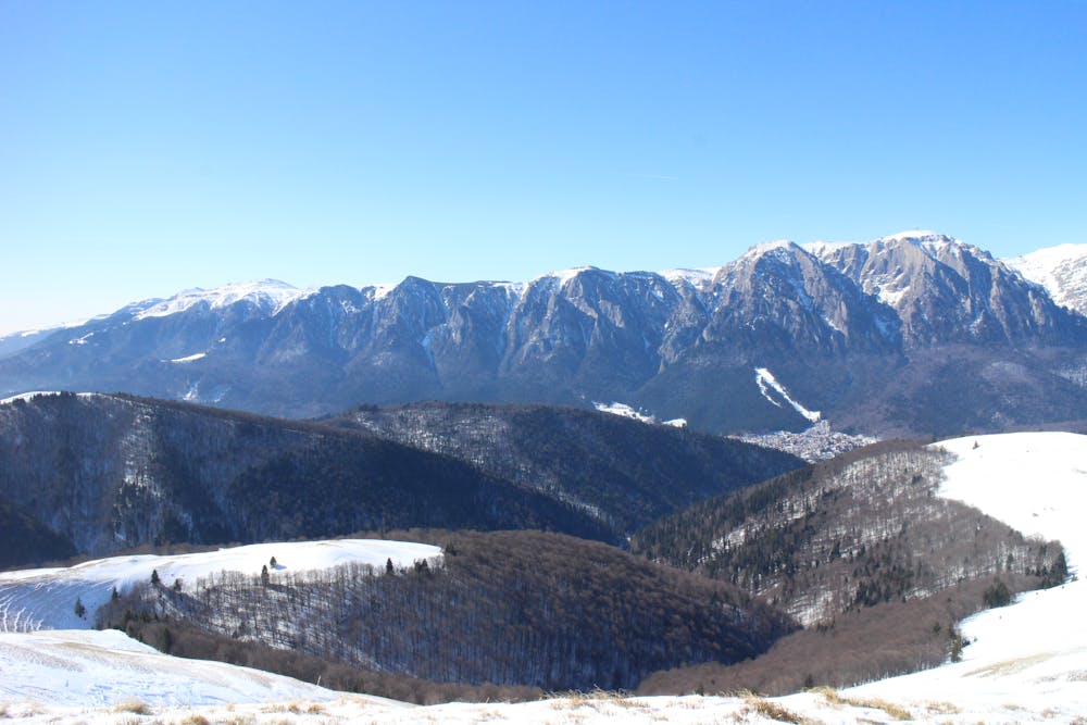 Massive views across to the Bucegi mountains from the summit of Cazacul