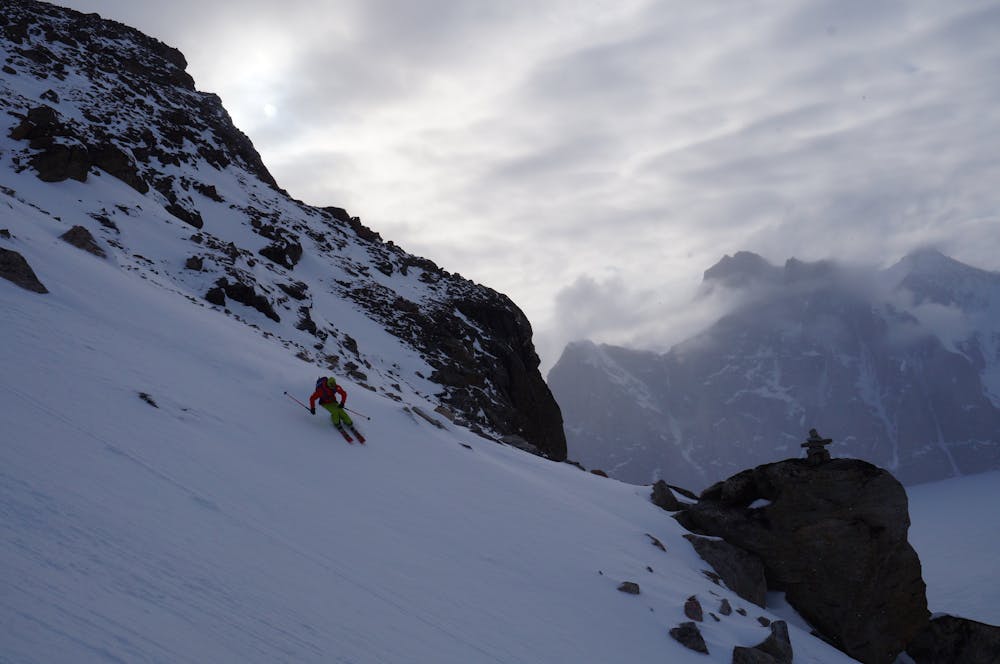 Skiing from the summit plateau area down to the start of the actual couloir. 